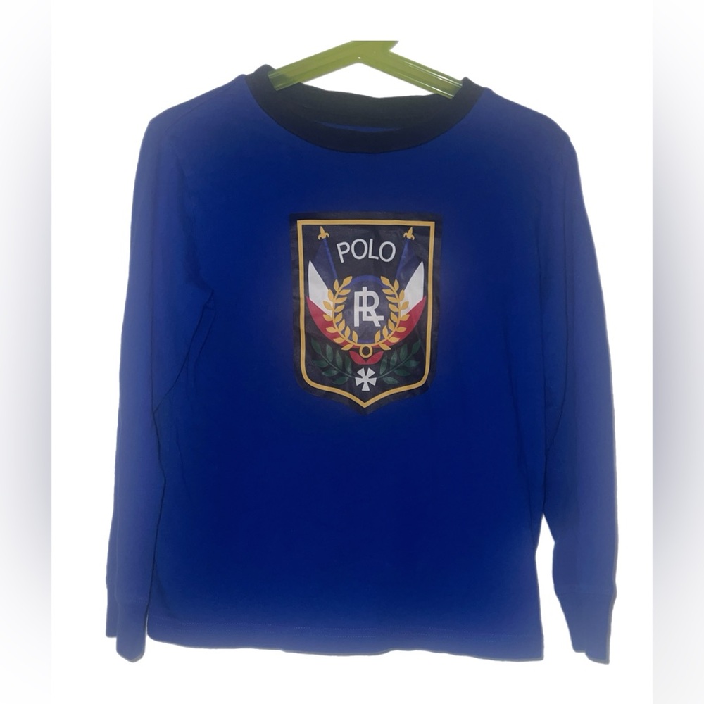 Slightly worn. Quality polo material